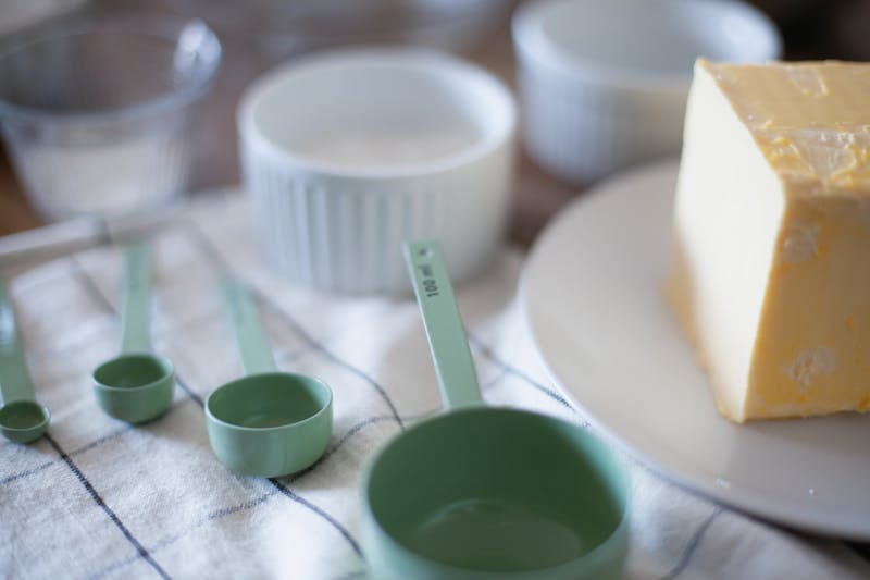 Stainless steel measuring cups arranged for baking